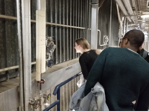 UT students take an up-close look at a boiler.