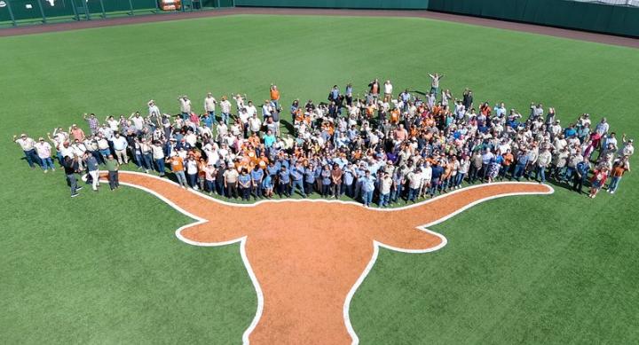 Campus Operations staff members at UFCU Disch-Falk Field